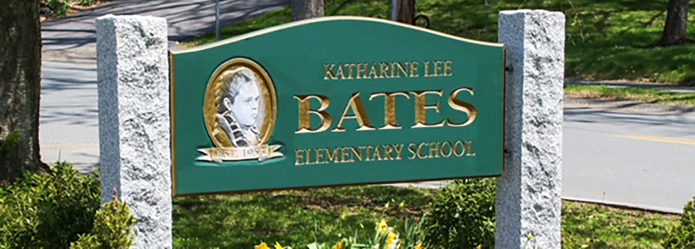 Bates School Sign with tulips